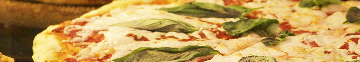 Eating Italian Pizza Vegetarian at Andiamo! restaurant in Santa Fe, NM.